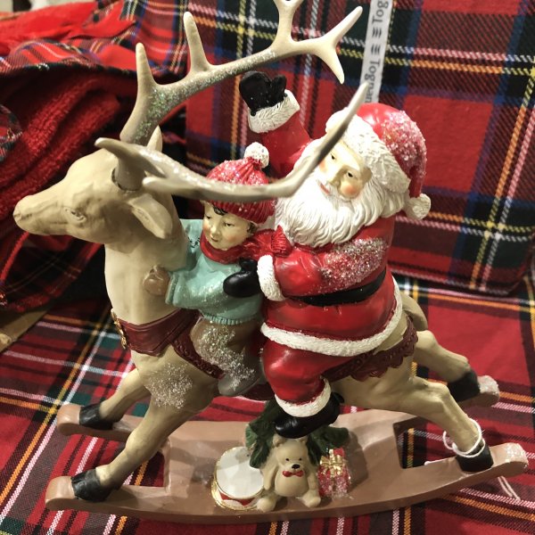 Decorazione cavallo a dondolo con babbo natale